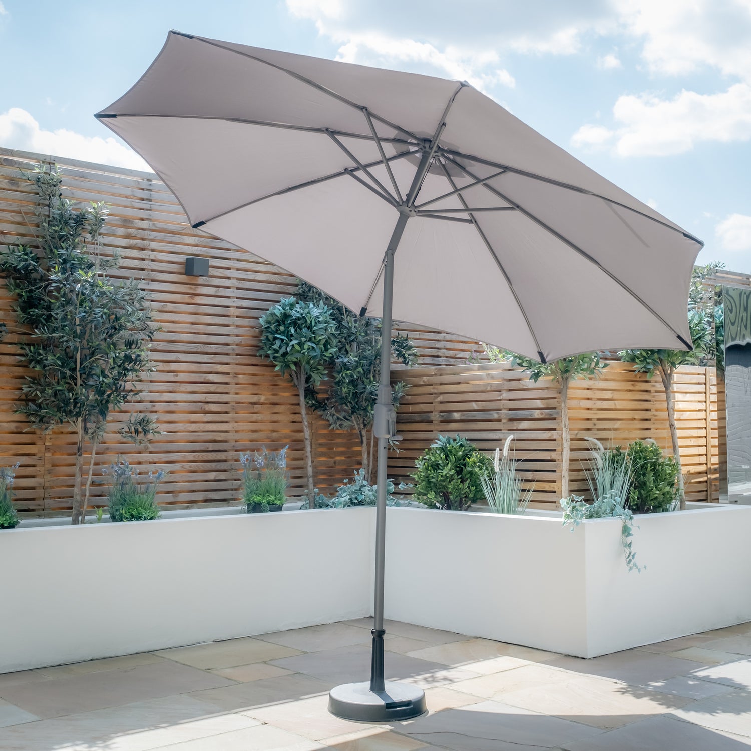 Maze Capri 2.7m Round Parasol Tilted Angle on Patio-Better Bed Company